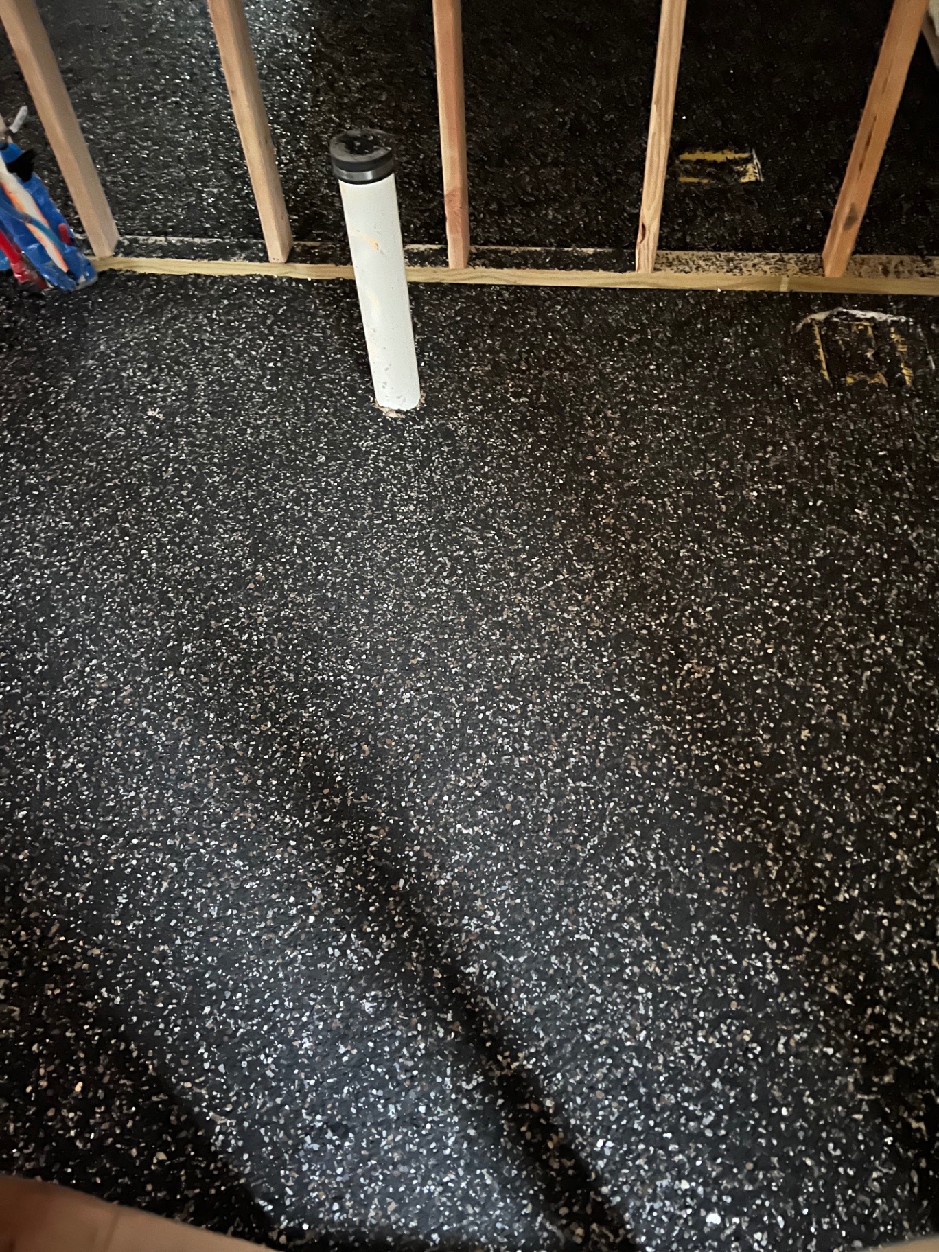 Black flake basement epoxy flooring in Nixa, MO
